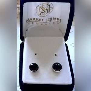 Garnet stud earrings in silver